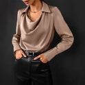 Elegant Lumina Wear Samantha blouse with draped neckline and long sleeves, shown in bronze color.