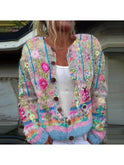 Blue Sanne cardigan by Lumina Wear featuring an elegant floral print, displayed on a hanger against a neutral background.