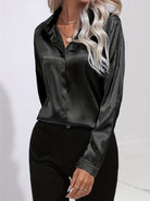Blue Sarah blouse by Lumina Wear featuring a button-down front and long sleeves, styled for elegant casual wear.