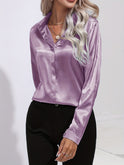 Light blue Sarah Lumina Wear button-down blouse with long sleeves, elegant and fitted, perfect for professional or casual wear.