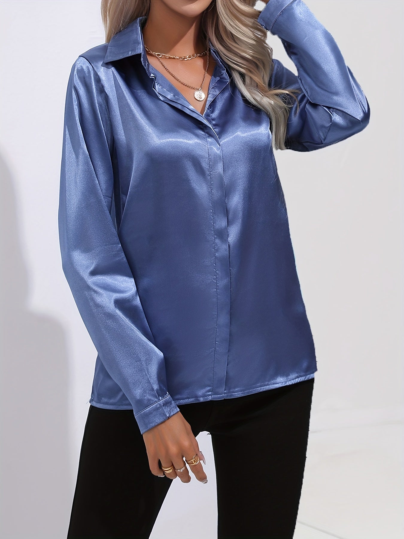 Blue Sarah Lumina Wear elegant button-down blouse with long sleeves, tailored fit, and classic collar, perfect for professional or casual wear.