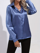 Blue Sarah Lumina Wear elegant button-down blouse with long sleeves, tailored fit, and classic collar, perfect for professional or casual wear.