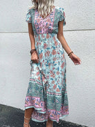 Seraphina Bloomfield green midi dress by Lumina Vancouver, featuring a stylish, fitted design with elegant details.