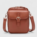 Lumina Wear Seraphina elegant compact crossbody handbag with adjustable strap, shown in brown leather.