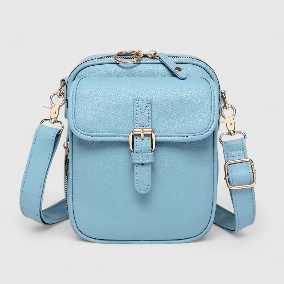 Lumina Wear Seraphina elegant compact crossbody handbag with adjustable strap in brown, showcasing stylish design and craftsmanship.