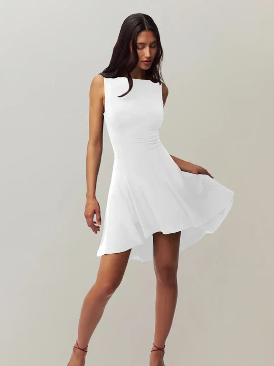 White satin finish mini dress by Lumina Vancouver, featuring a sleek, fitted silhouette and elegant design.