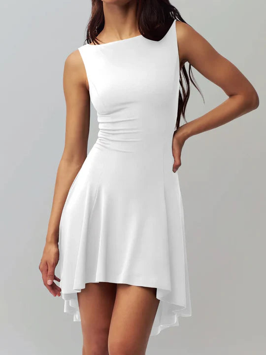 White satin finish mini dress by Lumina Vancouver, featuring a sleek, fitted design and elegant style perfect for special occasions.