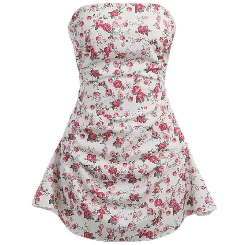 Pink satin strapless mini dress by Lumina Vancouver, shown on a model, fitted bodice with a smooth, shiny finish.