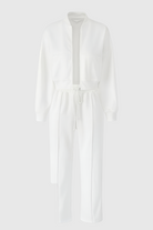 Lumina Wear Serena white lounge set with casual chic style and modern zipper details, comfortable loungewear for relaxed everyday wear.