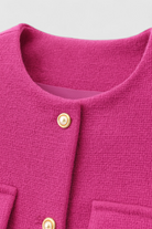 Lumina Wear Serena pink-red short women's jacket with versatile style, shown on a model, featuring a chic design and trendy fit.