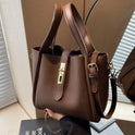 Serena Lumina coffee brown retro crossbody handbag with versatile design, featuring sleek style and adjustable strap.