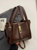 Lumina Wear Serena chic retro crossbody handbag in coffee brown with versatile design and stylish details.