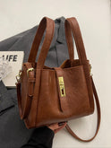 Lumina Wear Serena chic retro crossbody handbag in coffee brown with versatile design and stylish details.
