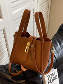 Lumina Wear Serena chic retro crossbody handbag in coffee brown with versatile design and stylish accents.
