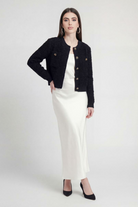 Lumina Wear Serena cozy black knit cardigan with open front, worn by a woman, perfect for casual and stylish layering.