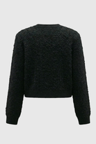 Black knit women's cardigan with open front from Lumina Wear, featuring a cozy, relaxed fit and soft texture.