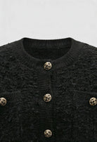 Black knit cardigan with open front from Lumina Wear, cozy women's sweater featuring a relaxed fit and soft fabric.