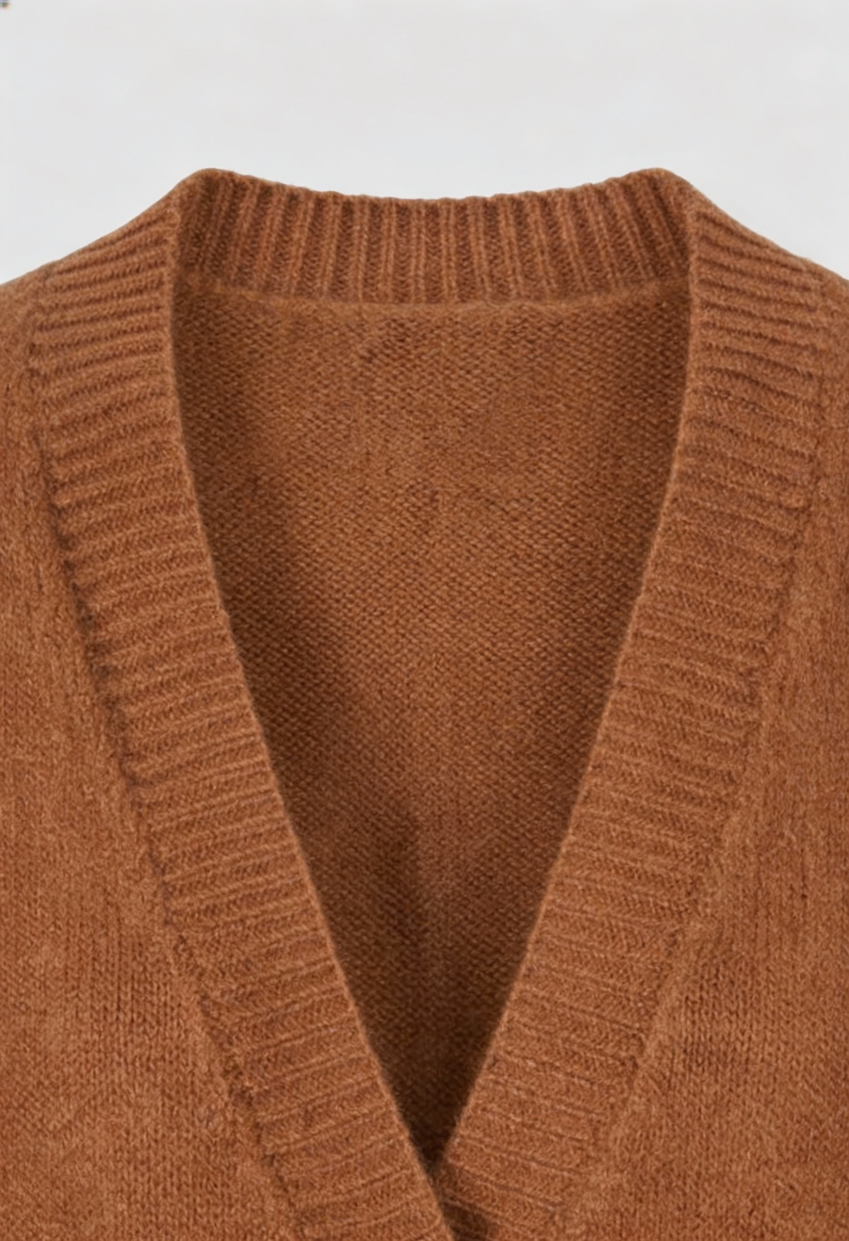 Lumina Wear Serena cozy brown knit cardigan for women with relaxed fit, featuring soft textured fabric and casual style.