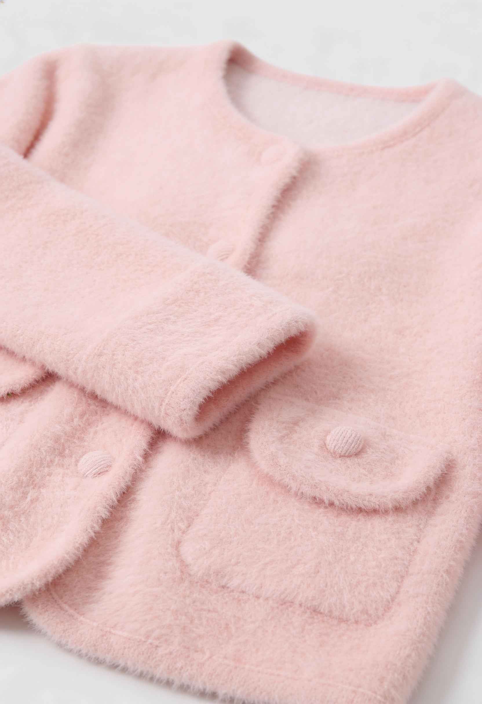 Pink long cardigan sweater with open front from Lumina Wear, featuring a cozy, relaxed fit and soft knit fabric.