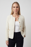 Lumina Wear Serena cozy white cardigan sweater with relaxed fit, soft knit fabric, and open front design.