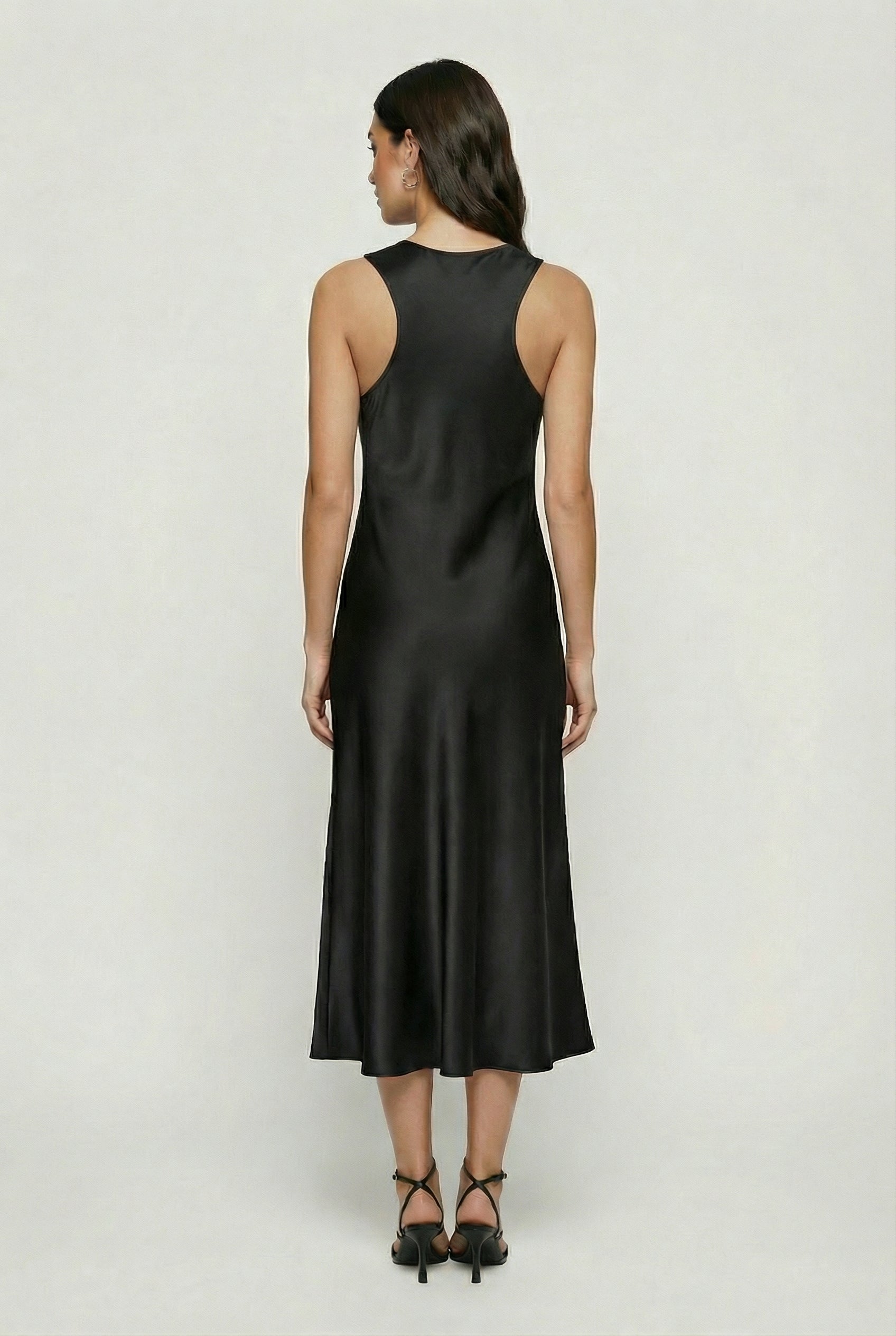 Elegant black maxi dress by Lumina Wear featuring a flattering silhouette, perfect for formal occasions.