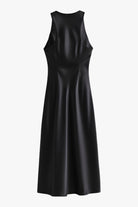 Elegant black maxi dress by Lumina Wear featuring a flattering silhouette and flowing fabric, perfect for formal occasions.