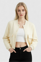 Elegant milk white Lumina Wear Serena bomber jacket with timeless design, featuring smooth fabric and classic silhouette.
