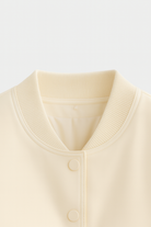 Serena Lumina Wear milk white bomber jacket with elegant, timeless design, featuring a sleek, minimalist style and soft fabric.