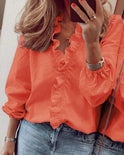 Blue Serena Lumina Wear elegant ruffle detail blouse with V-neck, featuring stylish design and lightweight fabric.