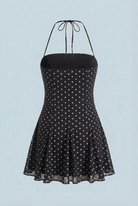 Serena black flared mini dress with polka dot print by Lumina Wear, stylish dress with a fitted waist and playful pattern.