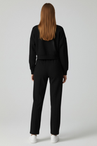 Black Serena Lumina Wear active two-piece set with high waist, loose fit, perfect for casual wear and active lifestyles.