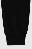 Black Serena Lumina Wear high-waist loose-fit two-piece pants set, casual active set with modern style and comfortable fit.
