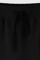 Lumina Wear Serena high waist loose fit two-piece pants set in black, casual active set for comfortable everyday wear.