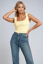 Serena Lumina yellow slim fit tank top with playful bow detail, casual camisole, lightweight and stylish for everyday wear