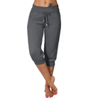 Trendy grey Capri trousers with elastic waistband from Lumina Wear, casual fit, shown on a model.