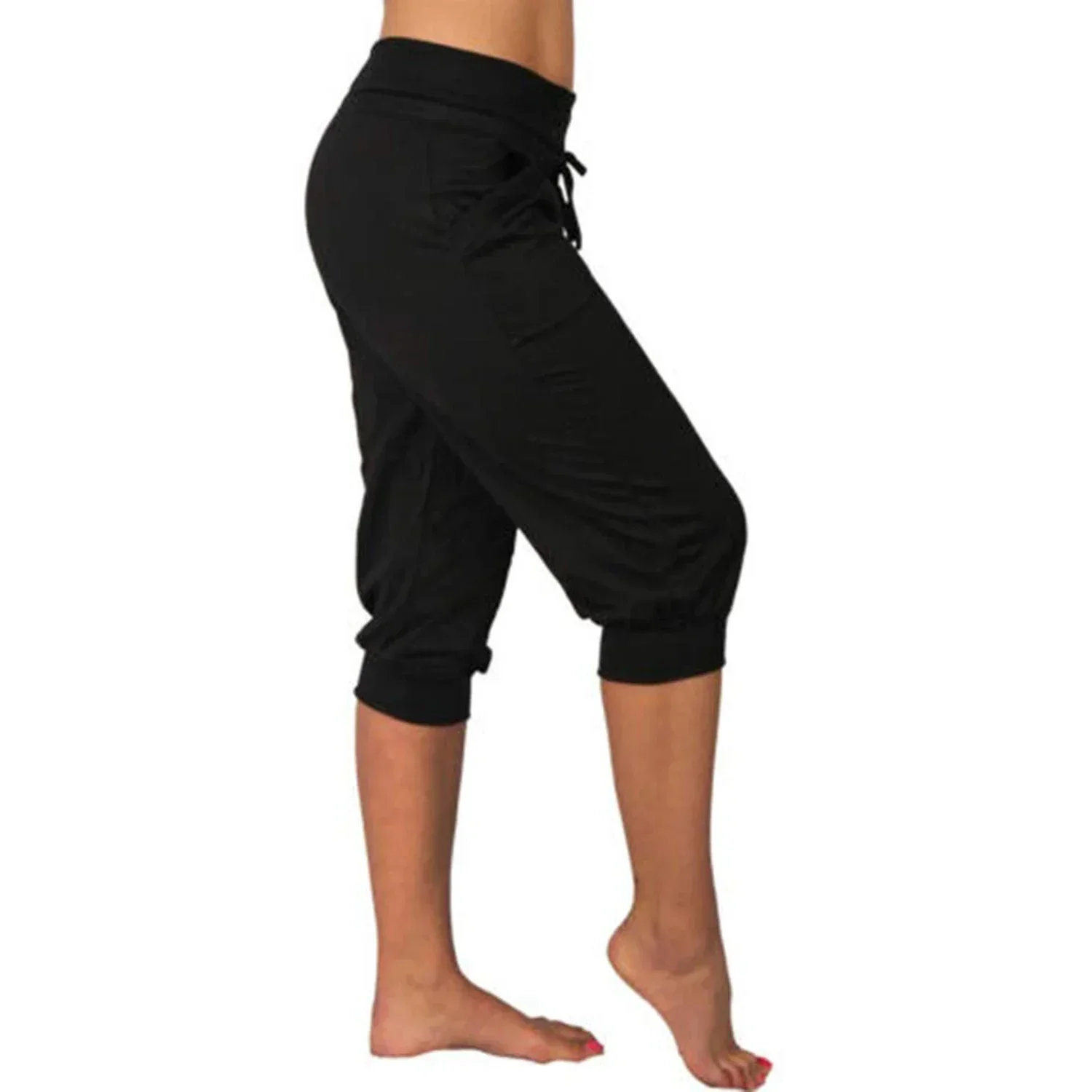 Trendy grey Capri trousers with elastic waistband by Lumina Wear, shown on a model with beige background.