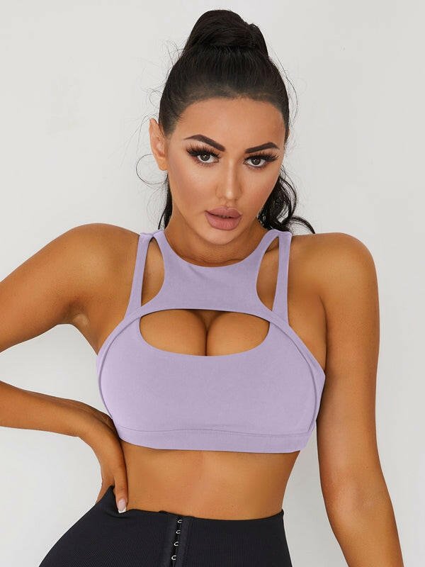 White Lumina Vancouver sexy cutout sports bra with stylish design and supportive fit for active wear.