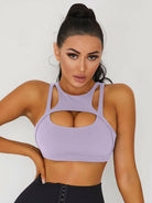 White Lumina Vancouver sexy cutout sports bra with stylish design and supportive fit for active wear.