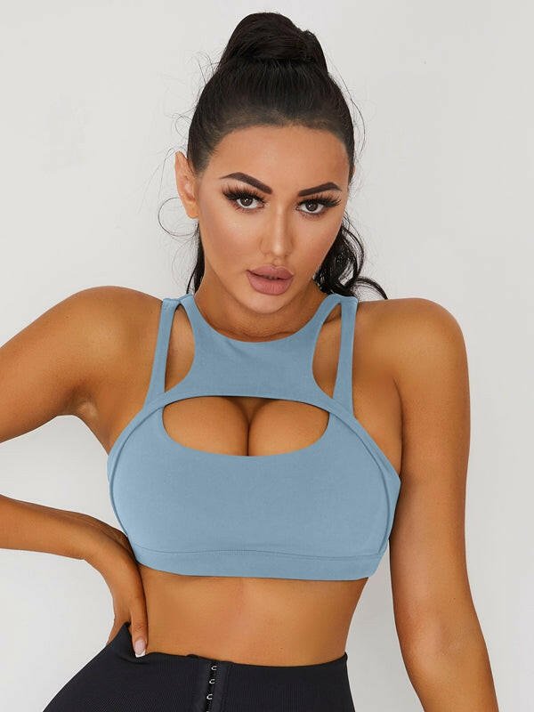 White Lumina Vancouver sexy cutout sports bra with stylish design and breathable fabric for active wear and workout comfort.