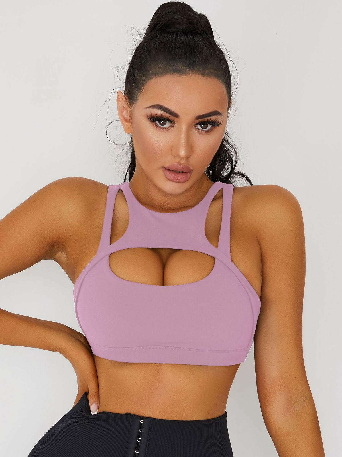 White Lumina Vancouver sexy cutout sports bra with stylish design, perfect for activewear and workout sessions.