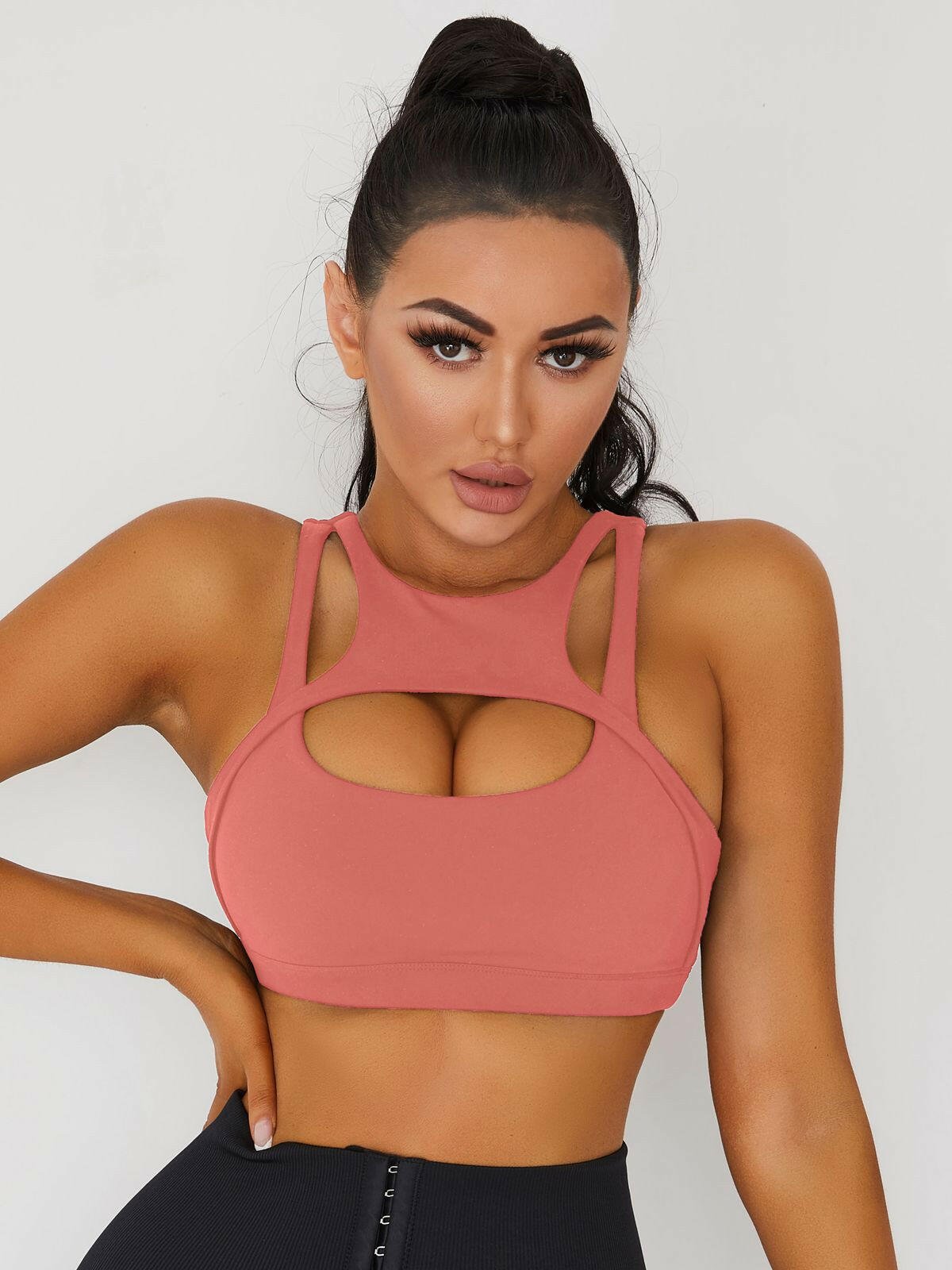 White Lumina Vancouver sexy cutout sports bra with stylish design and supportive fit, perfect for active wear and workouts.