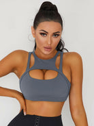 White Lumina Vancouver sexy cutout sports bra with stylish design and supportive fit for active wear.