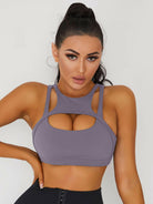 White Lumina Vancouver sexy cutout sports bra with stylish design and supportive fit, perfect for active wear.