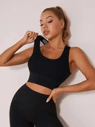 Black Lumina Vancouver high-impact sports bra with sexy hollow-out design, ideal for intense workouts and active wear.