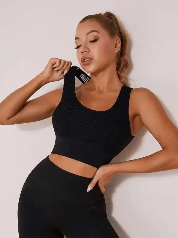 Black Lumina Vancouver high-impact sports bra with sexy hollow-out design, ideal for intense workouts and active wear.