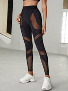 Black patchwork sports bra by Lumina Vancouver, stylish and supportive sports bra with unique patchwork design for active wear.