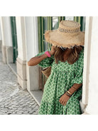Green and white Sharon™ spring dress by Lumina Vancouver, featuring a light, breezy design perfect for warm weather.