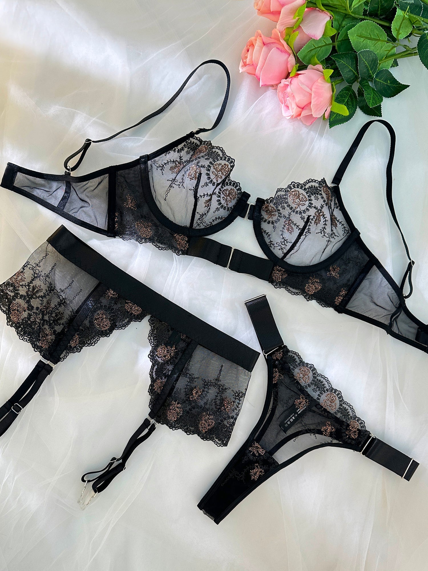 Sheer black and champagne embroidered lace lingerie set with three pieces from Lumina Vancouver, featuring delicate lace details.