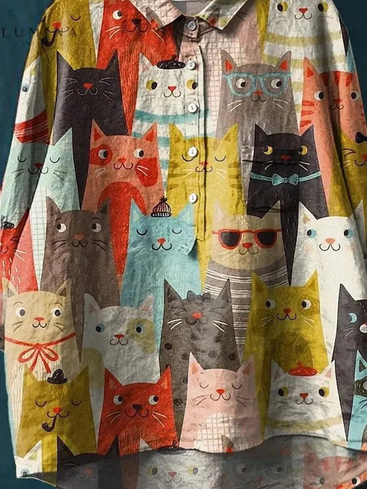 Multicolor Sheila Feline Art Tee by Lumina Vancouver featuring a vibrant cat illustration on soft cotton fabric.