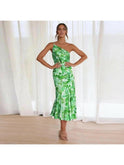 Sienna Tiphaine floral-patterned dress from Lumina Wear, featuring vibrant orange fabric and a stylish, feminine silhouette.